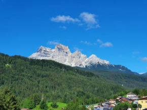 Accogliente attico vista Dolomiti